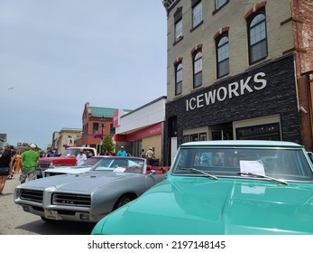 Yarmouth NS, CAN, July 16th, 2022 - People Browsing The Antique Cars Being Shown Off On Main Street In Yarmouth NS During The Annual Car Show.