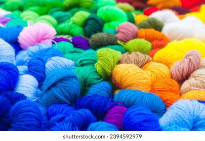 Yarn. Background from multi-colored threads for knitting closeup.