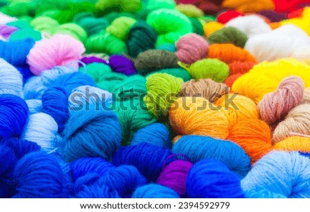 Yarn. Background from multi-colored threads for knitting closeup.