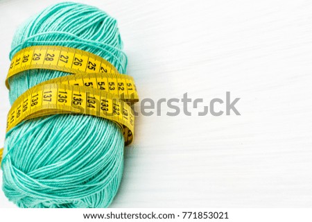 yarn ball with centimeter. concept needlework