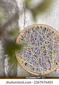 Yarn is a long continuous length of interlocked fibres, used in sewing, crocheting, knitting, weaving, embroidery, ropemaking, and the production of textiles. Selective focus.