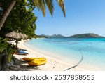 Yasawa, Fiji: Idyllic beach with palm trees and turquoise water in the Yasawa islands group in Fiji in the south Pacific ocean