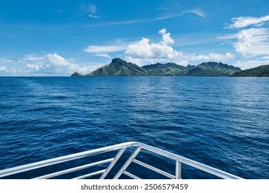 Yasawa Group of islands in Fiji seen from a small ship. Stunning volcanic island archipelago. Beautiful, paradise-like small islands close to the main islands of Fiji. Yasawa island fast ferry.  - Powered by Shutterstock