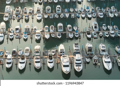 Yatch Harbor Marina Pier And Boat Dock Yatchs And Vessels Awaiting The Open Sea. Aerial Drone View Looking Straight Down Above T-Head.
