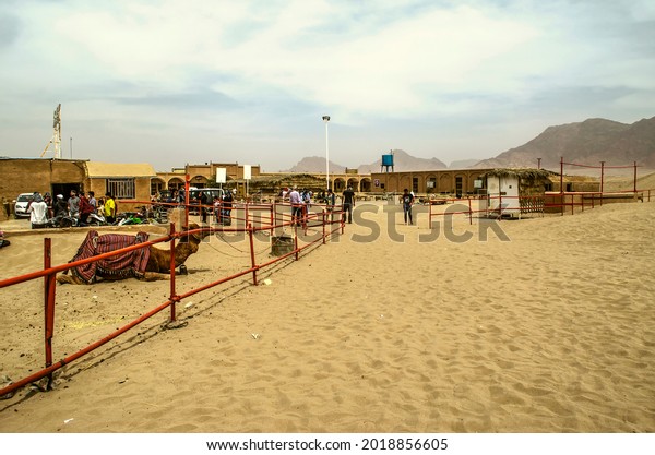 Yazd, Desert, Iran, February 20, 2021: Clay Safari\
Fun Club buildings with camel paddock, ATV ride and desert dune car\
ride.
