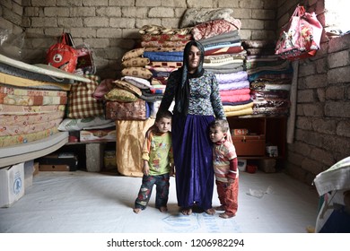 A Yazidi People Who Escaped Abuse From ISIS Outside Her Tent In Kanke Refugee Camp 17 MAY 2014. DOHUK, KURDISTAN, IRAQ -