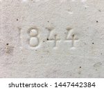 The year 1844 carved in sandstone, produced at that time