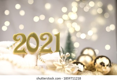 Year 2021 numbers on bokeh background, Christmas, greeting card, new year background - Shutterstock ID 1859711218