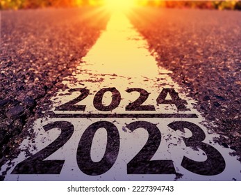The year 2023 ends and the year 2024 dawns. - Shutterstock ID 2227394743