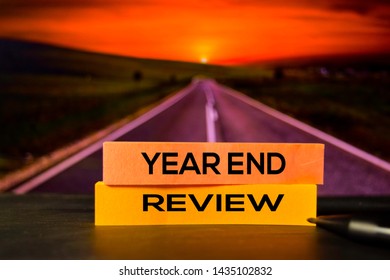 Year End Review On The Sticky Notes With Bokeh Background