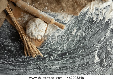 Similar – Image, Stock Photo Bread and flour on a rustic wooden background