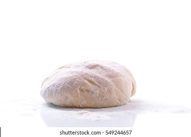 Yeast Dough With A Wooden Rolling Pin