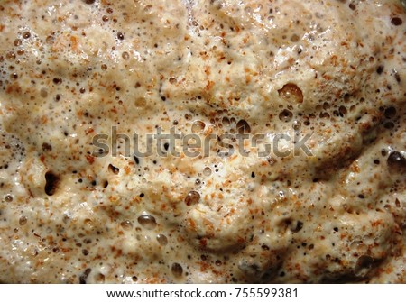 Yeast in a glass. Nutritional yeast, natural source of vitamin B. Saccharomyces cerevisiae