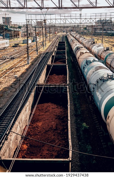 Yekaterinburg, Russia - 2019: trains\
stand on railway tracks, wagons and tanks are filled with\
cargo