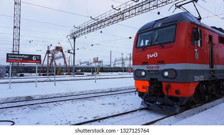 Yekaterinburg, Russia - December 23, 2018 - RZD (Russian Railways) Electric Locomotive EP2K On The Rossiya Train No.01 From Vladivostok To Moscow Are Stopping At Yekaterinburg Railway Station In  Wint