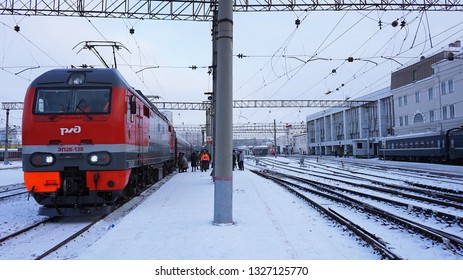 Yekaterinburg, Russia - December 23, 2018 - RZD (Russian Railways) Electric Locomotive EP2K On The Rossiya Train No.01 From Vladivostok To Moscow Are Stopping At Yekaterinburg Railway Station In  Wint