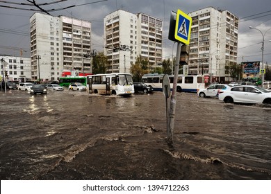 Yekaterinburg, Russia - May, 9, 2019: Natural Disaster In A Form Of Long Hailstorm Sinked Cars, Flooded Main Streets And Broke Sewage - All In One Hour.