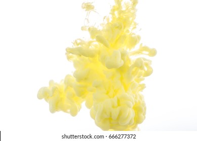 Yellow Acrylic Colors. Ink Swirling In Water. Color Explosion