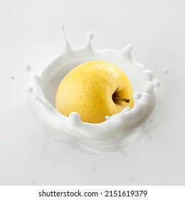 Yellow Apple Falls Into Milk, Yoghurt, Sour Cream, Splash