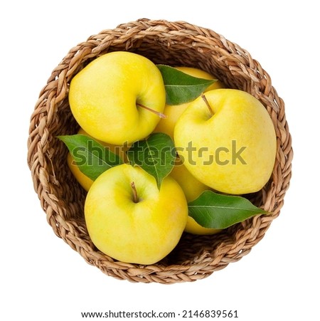 yellow apples in basket path isolated on white top view