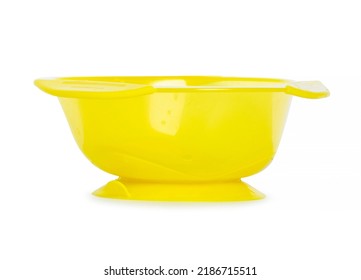 Yellow Baby Plastic Plate With A Suction Cup On White Background Isolation