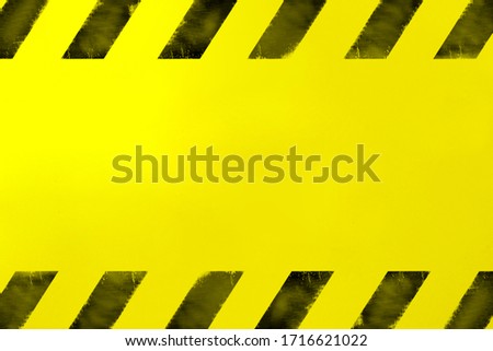 Yellow background with hazard warning signs. Abstract backdrop