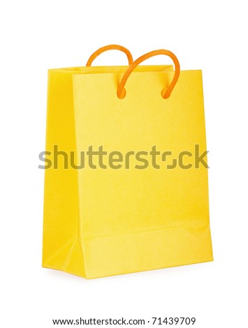 Yellow bag with purchases on the white
