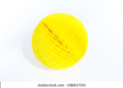 Yellow Ball Of Paper Honeycomb. White Background. Paper Craft. Holiday Honey Circle.