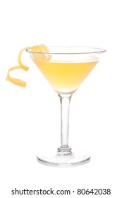 Yellow Banana Cocktail In Martini Glass With Lemon Twist Isolated On A White Background