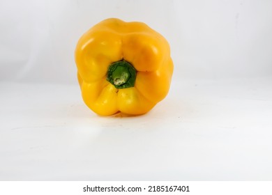 Yellow bellpepper or capsicum isolated on white background