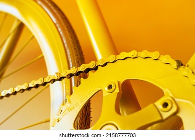 Yellow bicycle star and chain. Restoration of old things and metal parts. Close-up - Powered by Shutterstock