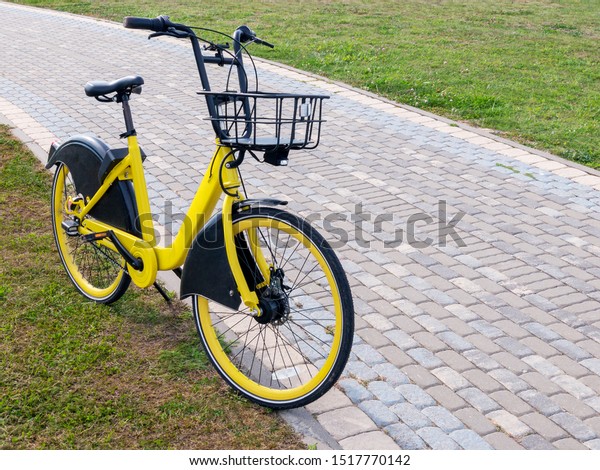 yellow bike with a basket