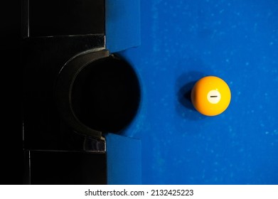 Yellow Billiard Ball Floor Number One Is Lying On The Table With A Blurred Background