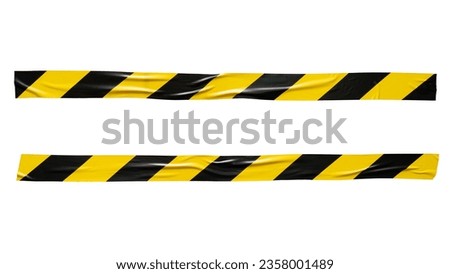 Yellow and black barricade tape on white background with clipping path