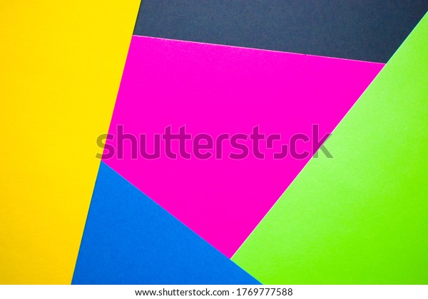 Yellow,\
black, green, blue and pink abstract\
background