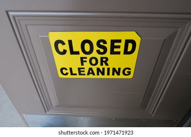 Yellow And Black Sign. Closed For Cleaning. A Clean Public Bathroom Is A Wonderful Thing. Wash Your Hands.                            