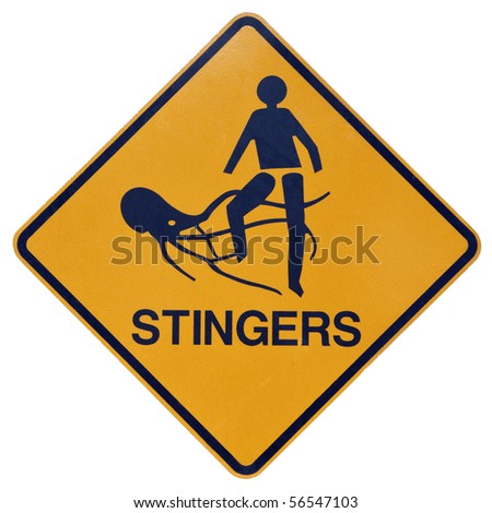 A yellow and black warning sign for dangerous marine stingers or jellyfish in tropical Australia. Isolated on white with clipping path