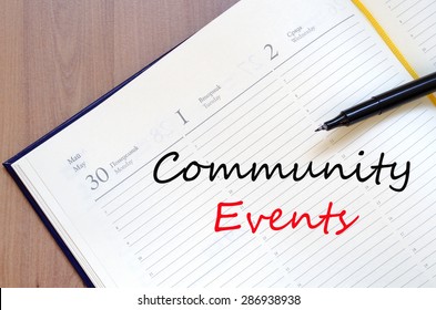 Yellow Blank Notepad On Office Wooden Table Community Events Concept