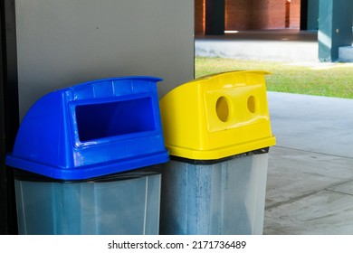 Yellow And Blue Recycle Bin For Separating Various Types Of Garbage In Office.