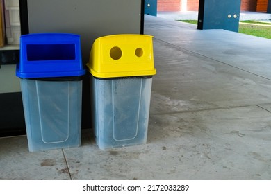 Yellow And Blue Recycle Bin For Separating Various Types Of Garbage In Office.