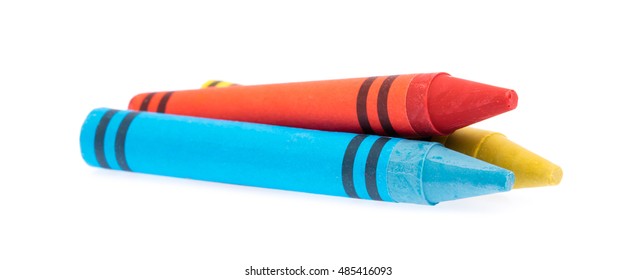 Yellow, Blue, And Red Crayon Isolated On White Background