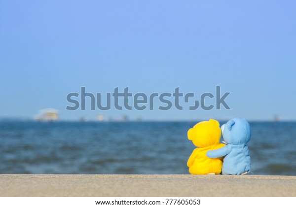 blue and yellow teddy bear