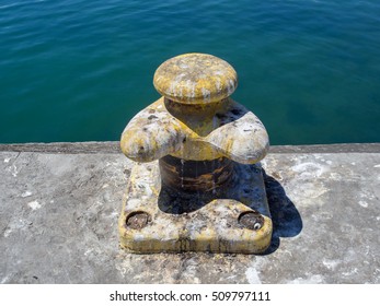 Yellow Boat Bollard Covered In Seagull Droppings