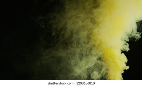 Yellow Bomb Smoke On Black Background