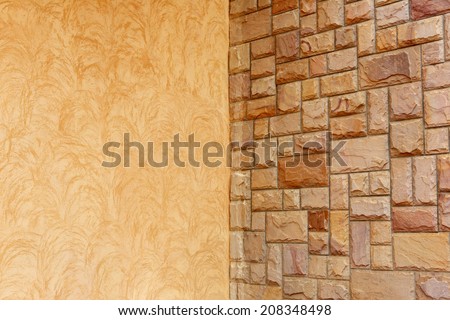Yellow and brown grunge cement wall background