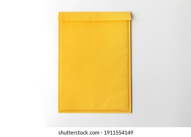 Yellow Bubble Envelope On White Background.