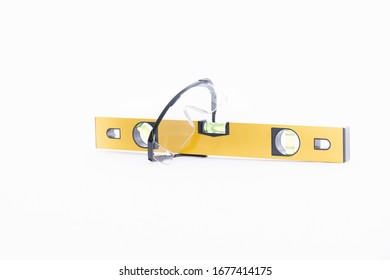 Yellow Bubble Level Tool With Safety Glasses