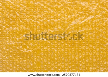 Yellow bubble wrap packing texture