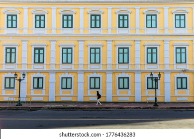 Yellow Building Architecture With Green Windows Of The Ministry Of Defence In Bangkok, Thailand.