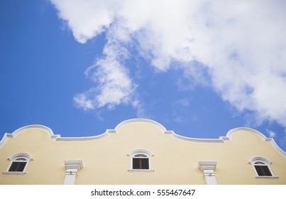 Yellow building and a blue sky in Curacao, Caribbean